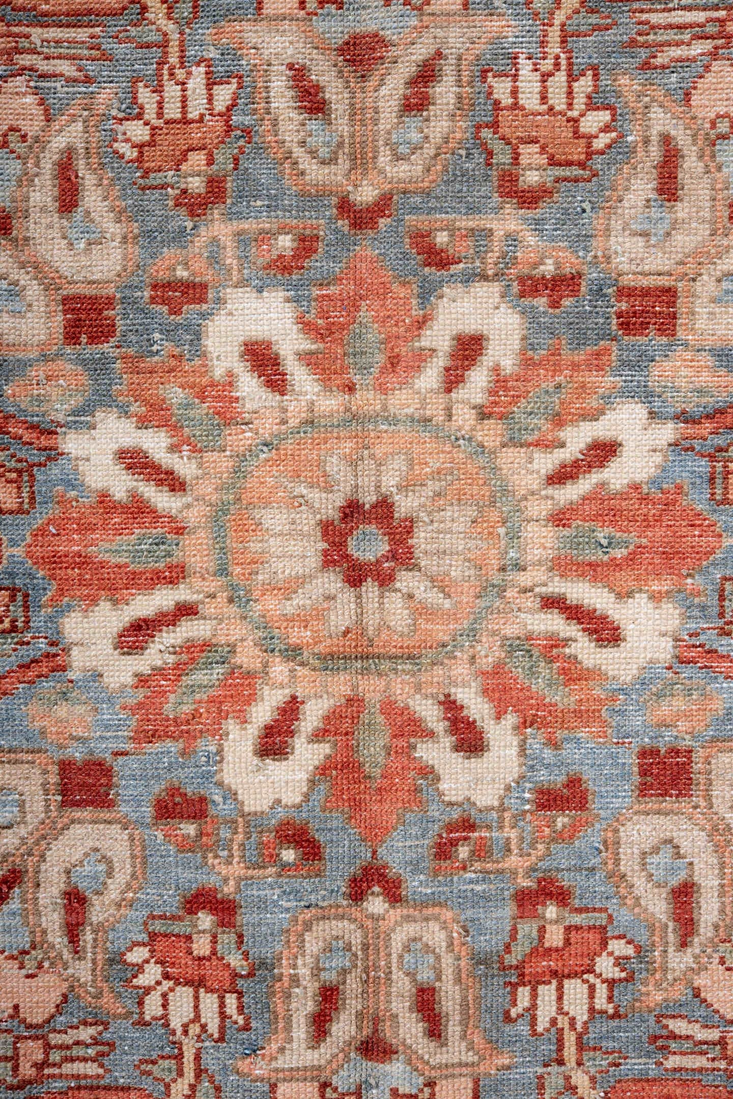7' x 10' one-of-a-kind handmade vintage Baktiary large size rug. Color palette: ivory, rose, light blue, rust, burgundy