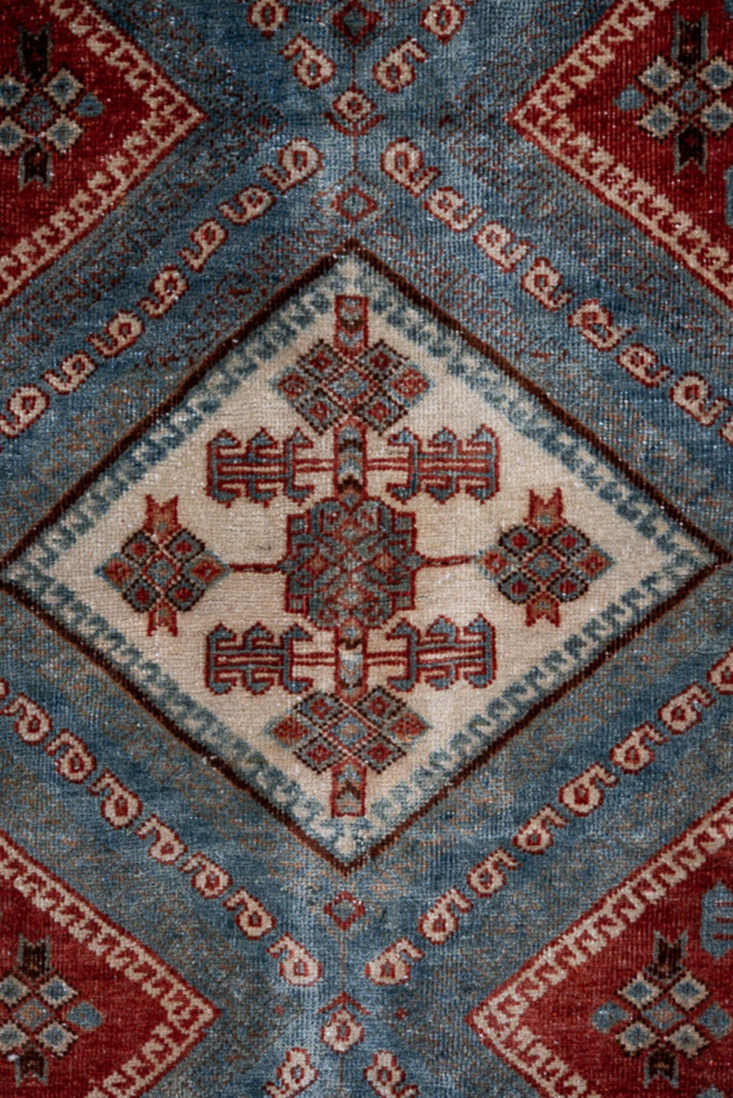 4' x 5' one-of-a-kind handmade antique Afshar small size rug. Color palette: sky blue, rust, ivory, deep brown, slate
