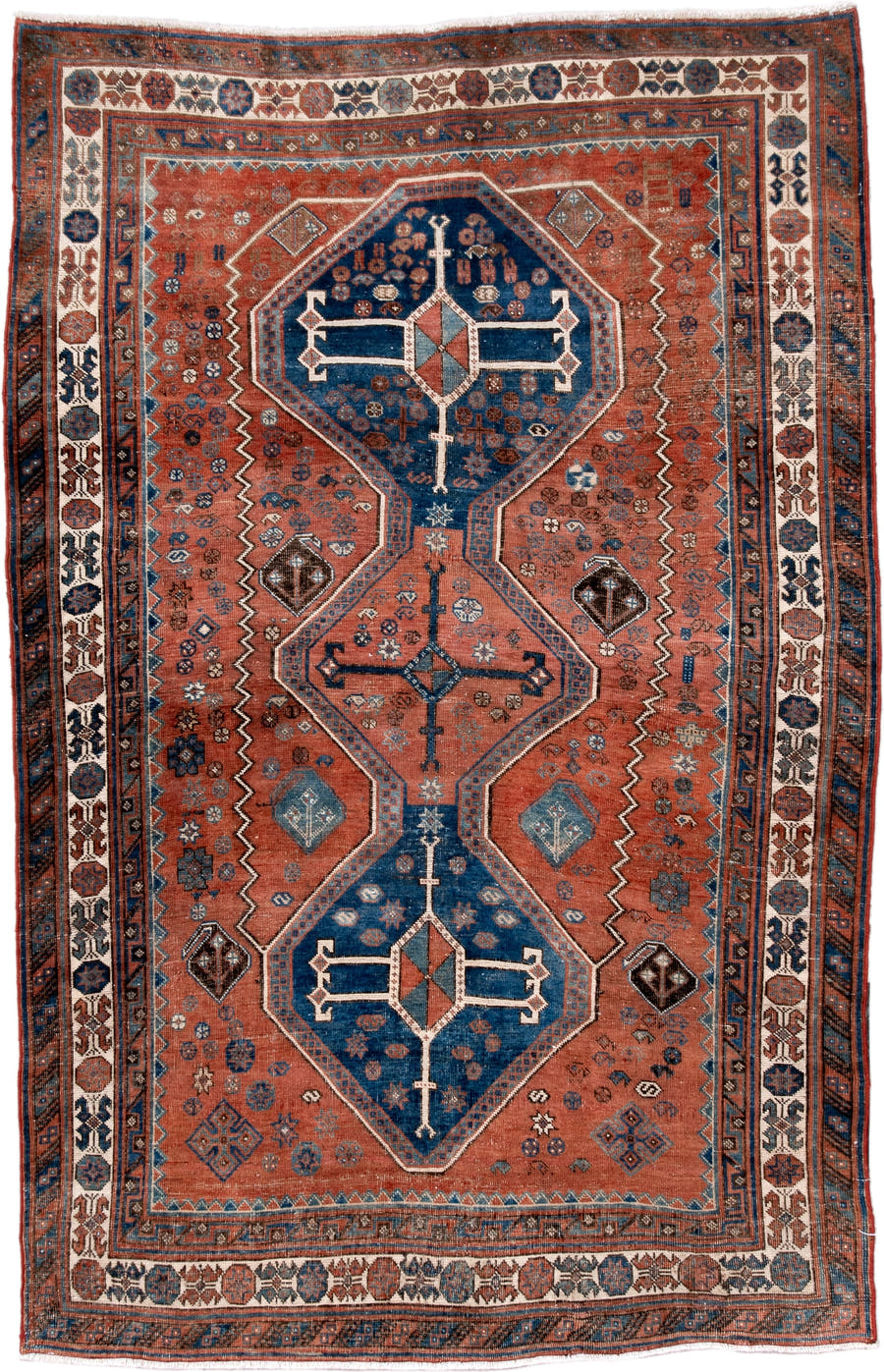 4' x 6' one-of-a-kind handmade antique Afshar small size rug. Color palette: terra cotta, indigo, ivory, rust, slate, camel