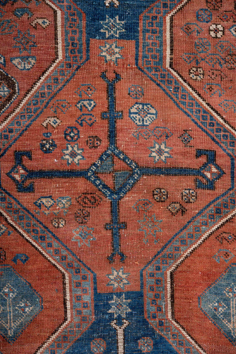 4' x 6' one-of-a-kind handmade antique Afshar small size rug. Color palette: terra cotta, indigo, ivory, rust, slate, camel