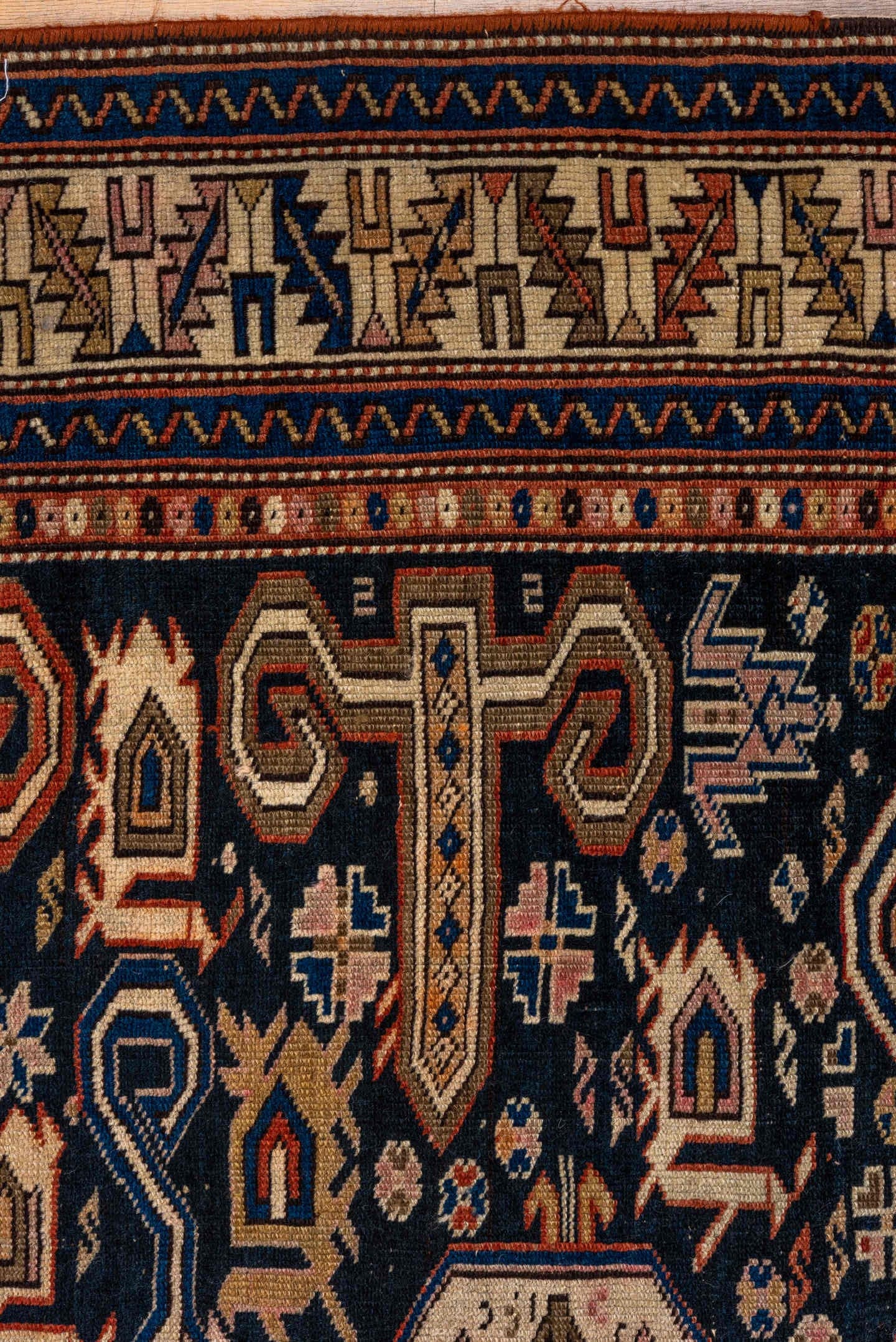 3' x 5' one-of-a-kind handmade antique Perpedil small size rug. Color palette: navy, ivory, camel, sky_blue, rust, rose