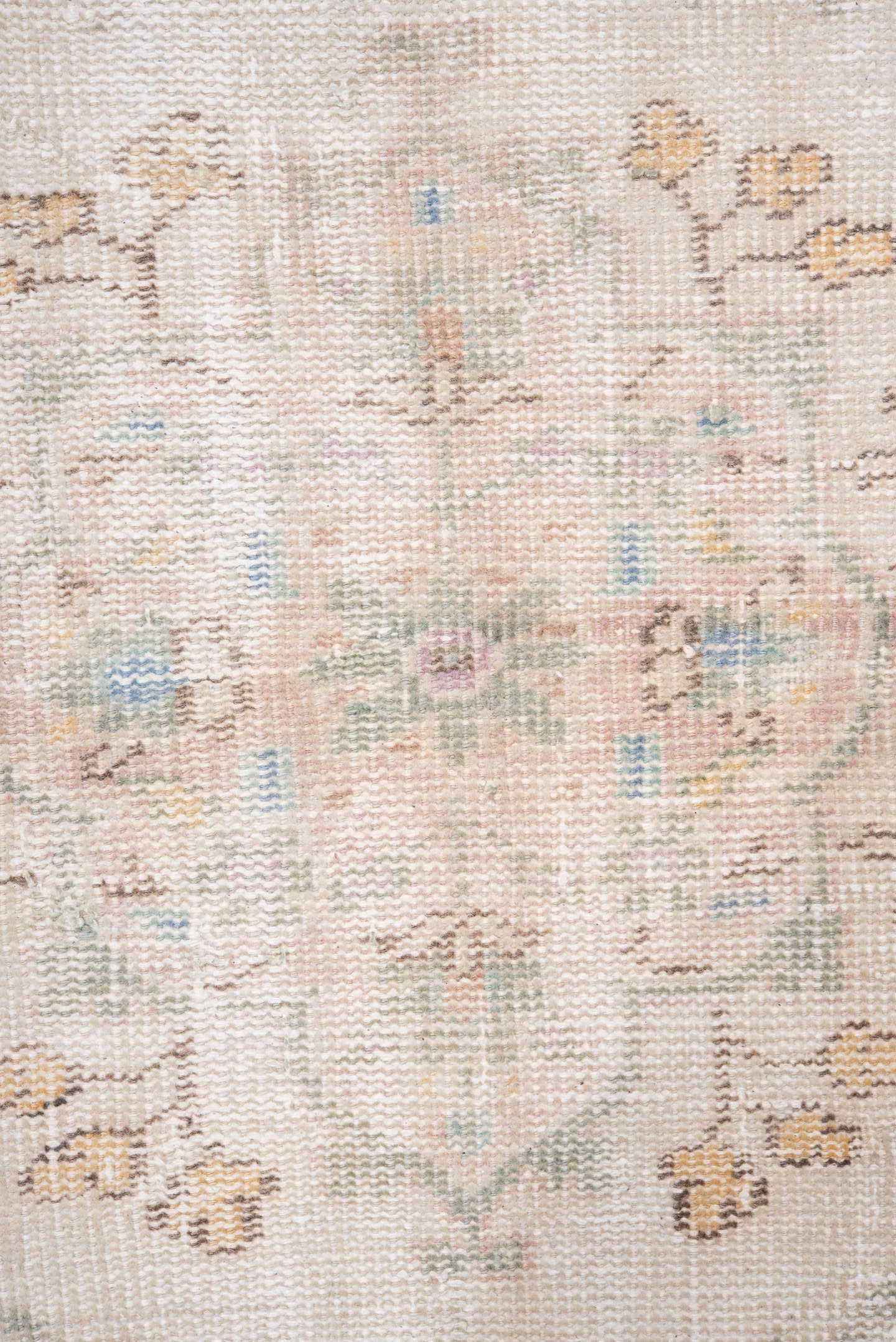 7' x 9' one-of-a-kind handmade antique Sparta rug. Color palette: ivory, blush, pale blue, sand, taupe, sage, peach, pink