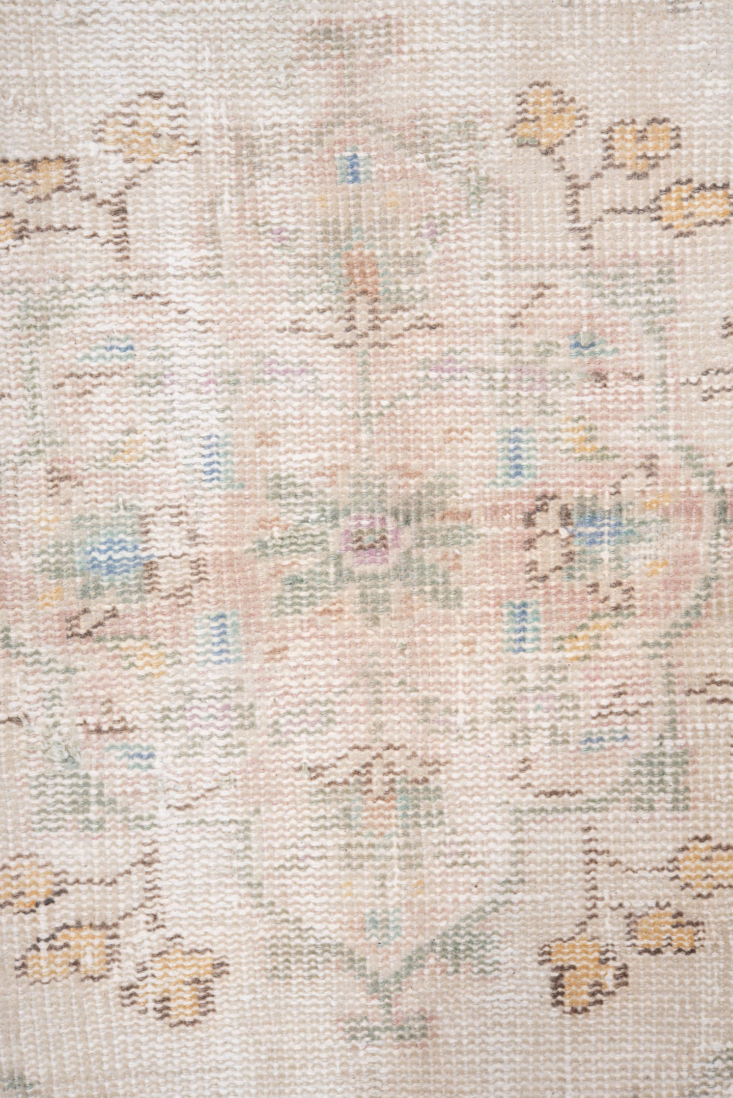7' x 9' one-of-a-kind handmade antique Sparta rug. Color palette: ivory, blush, pale blue, sand, taupe, sage, peach, pink