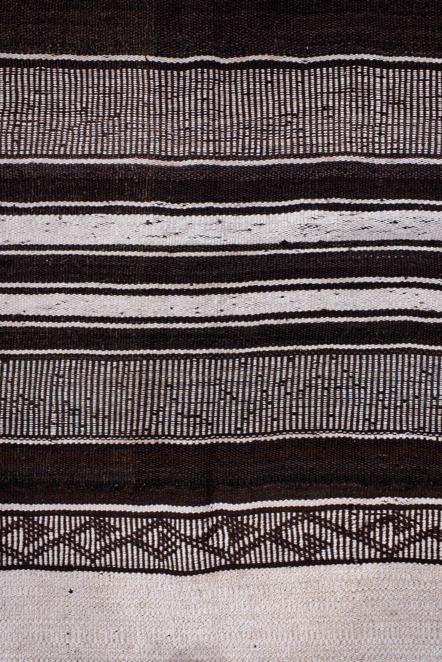 12' x 13' one-of-a-kind handmade antique Flatweave oversize rug. Color palette: ivory, charcoal, brown, taupe, gray, black