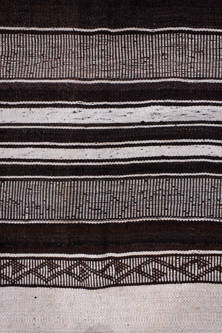 12' x 13' one-of-a-kind handmade antique Flatweave oversize rug. Color palette: ivory, charcoal, brown, taupe, gray, black