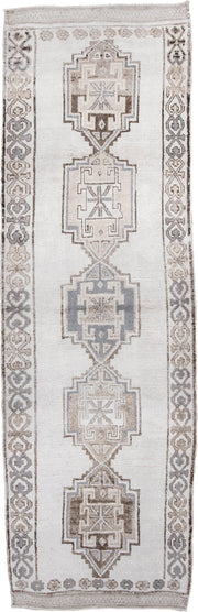4' x 12' one-of-a-kind handmade vintage Kars runner rug. Color palette: ivory, taupe, brown, gray, beige