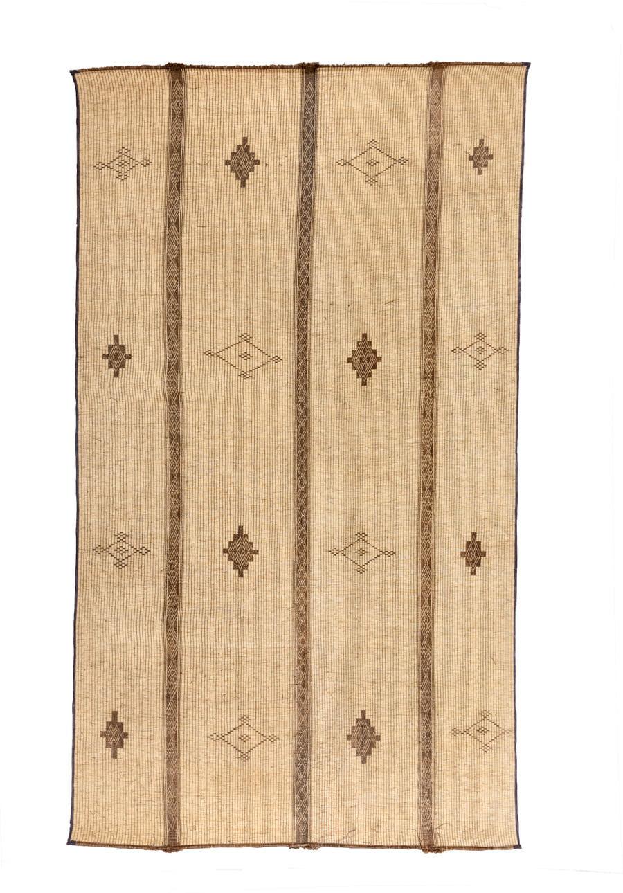 8' x 16' one-of-a-kind handmade vintage Tuareg rug. Color palette: camel, brown, tan, taupe, ivory, beige, gray