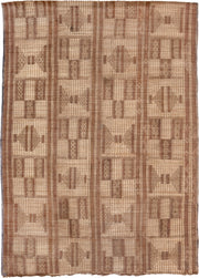 6' x 8' one-of-a-kind handmade vintage Tuareg medium size rug. Color palette: camel, tan, taupe, sienna, ivory, beige, gray