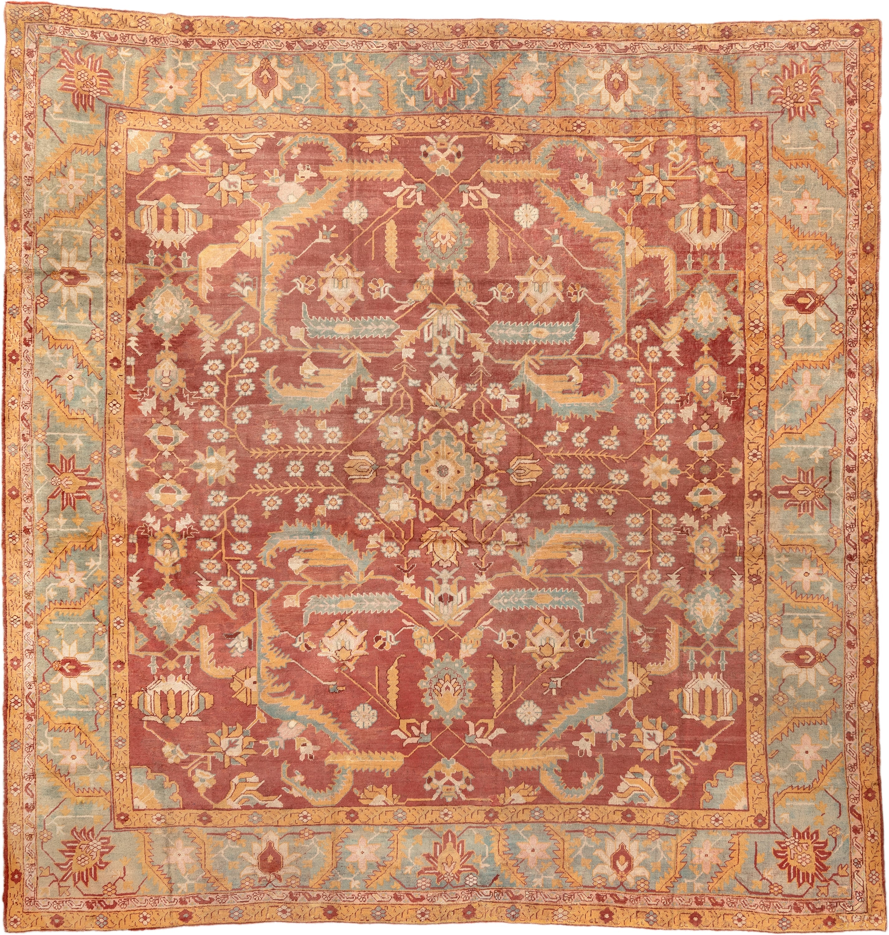 13' x 13' one-of-a-kind handmade antique Oushak oversize rug. Color palette: terracotta, aqua, gold, ivory, camel, sage