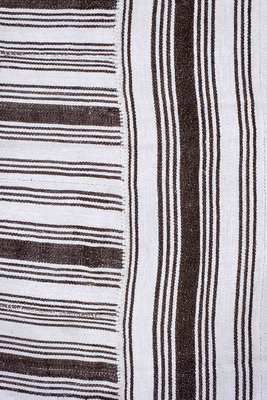 12' x 18' one-of-a-kind handmade antique Flatweave oversize rug. Color palette: ivory, dark brown, brown