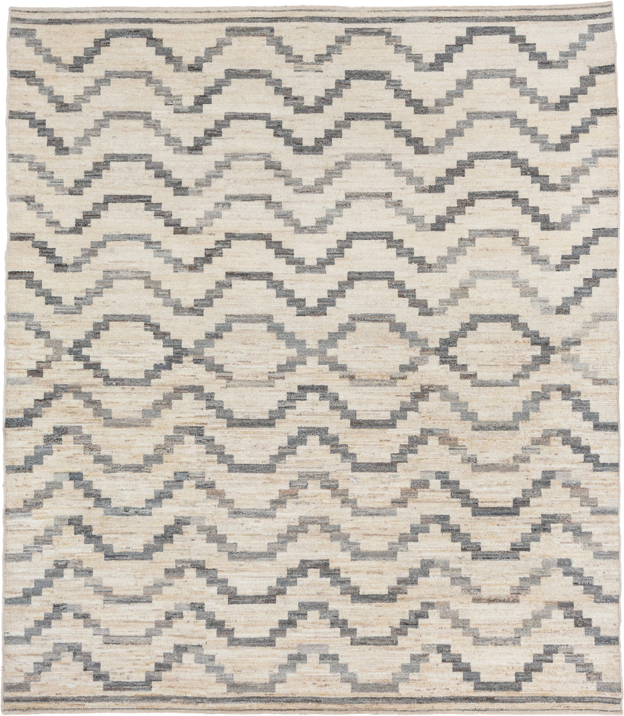 8' x 9' one-of-a-kind handmade vintage Afghan rug. Color palette: ivory, gray, charcoal, cream, taupe, black, beige
