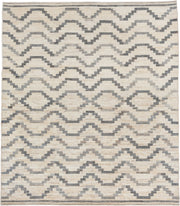8' x 9' one-of-a-kind handmade vintage Afghan rug. Color palette: ivory, gray, charcoal, cream, taupe, black, beige