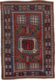 5' x 7' one-of-a-kind handmade vintage Kazak rug. Color palette: red, ivory, blue, navy, brown, rust, gold, terracotta
