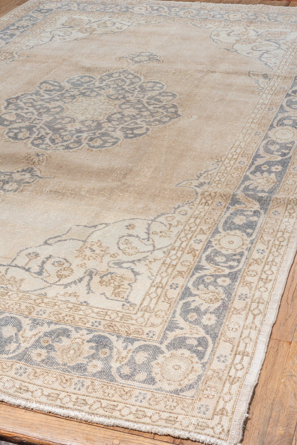 6' x 10' one-of-a-kind handmade vintage Oushak large size rug. Color palette: ivory, beige, faded blue, tan, taupe, blue