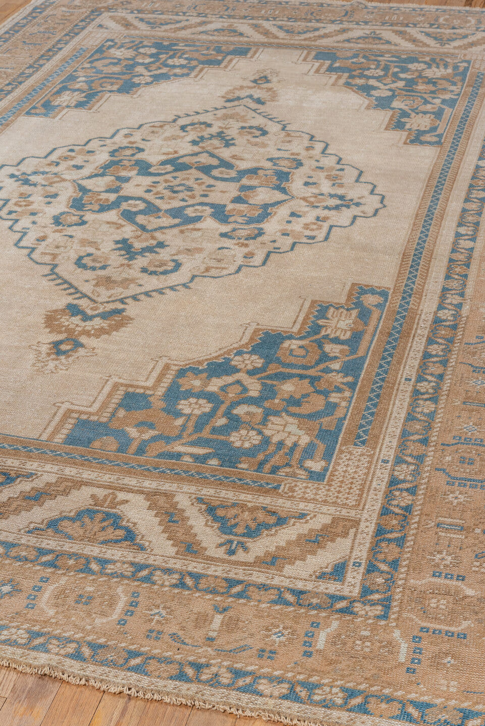 6' x 9' one-of-a-kind handmade vintage Oushak medium size rug. Color palette: ivory, beige, sky blue, taupe, camel
