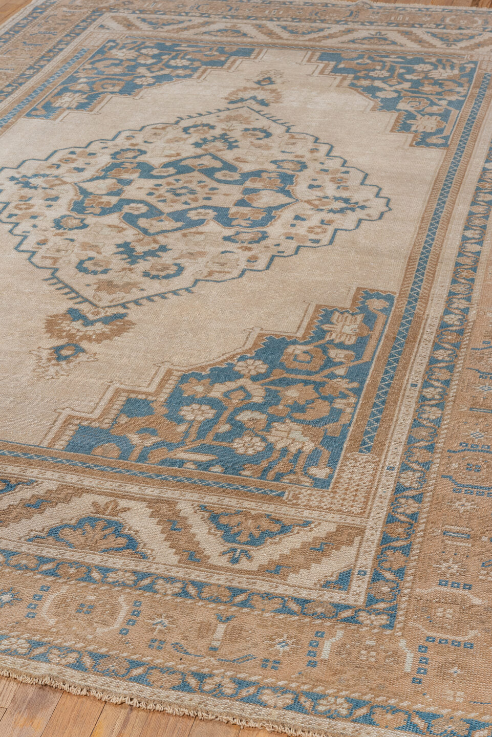 6' x 9' one-of-a-kind handmade vintage Oushak medium size rug. Color palette: ivory, beige, sky blue, taupe, camel