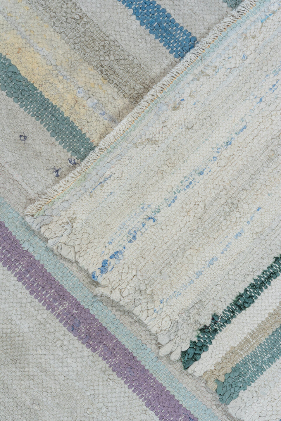 6' x 8' one-of-a-kind handmade antique Rag Rug medium size rug. Color palette: ivory, light blue, taupe, charcoal, saffron
