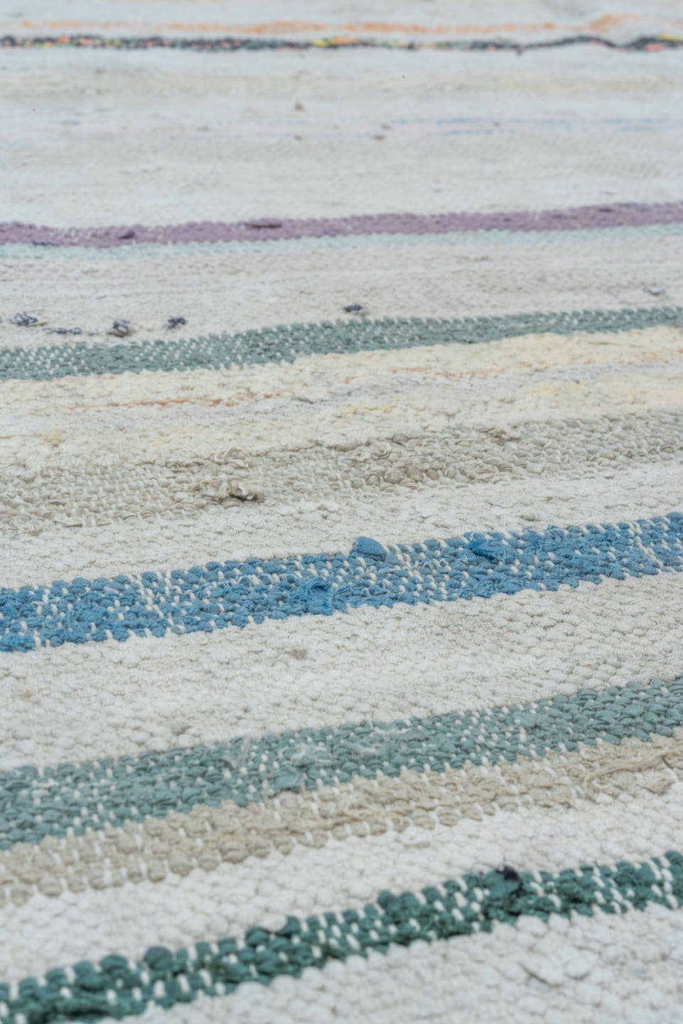 6' x 8' one-of-a-kind handmade antique Rag Rug medium size rug. Color palette: ivory, light blue, taupe, charcoal, saffron