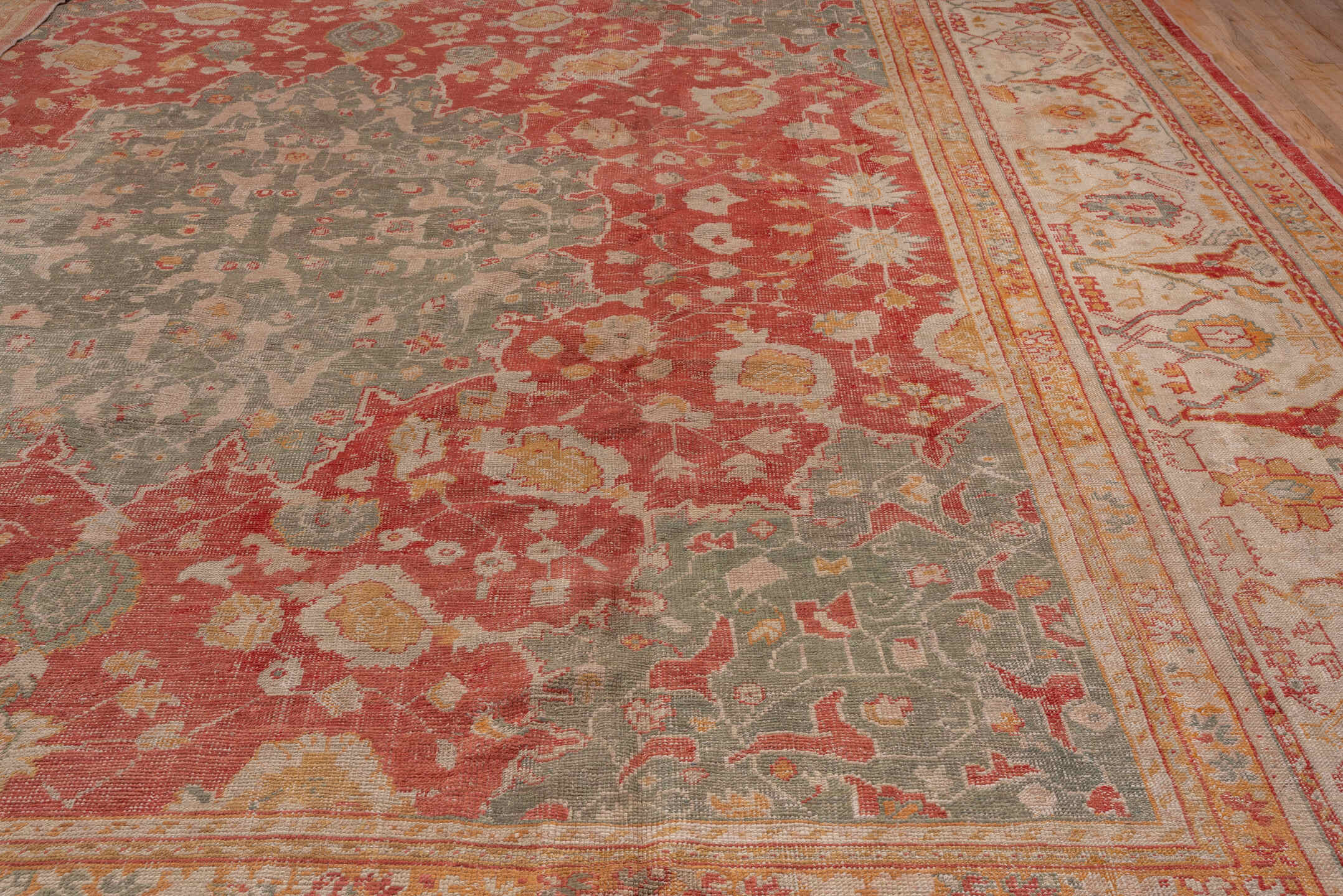 16' x 17' one-of-a-kind handmade vintage Oushak oversize rug. Color palette: coral, ivory, sage, gold, terra cotta, beige