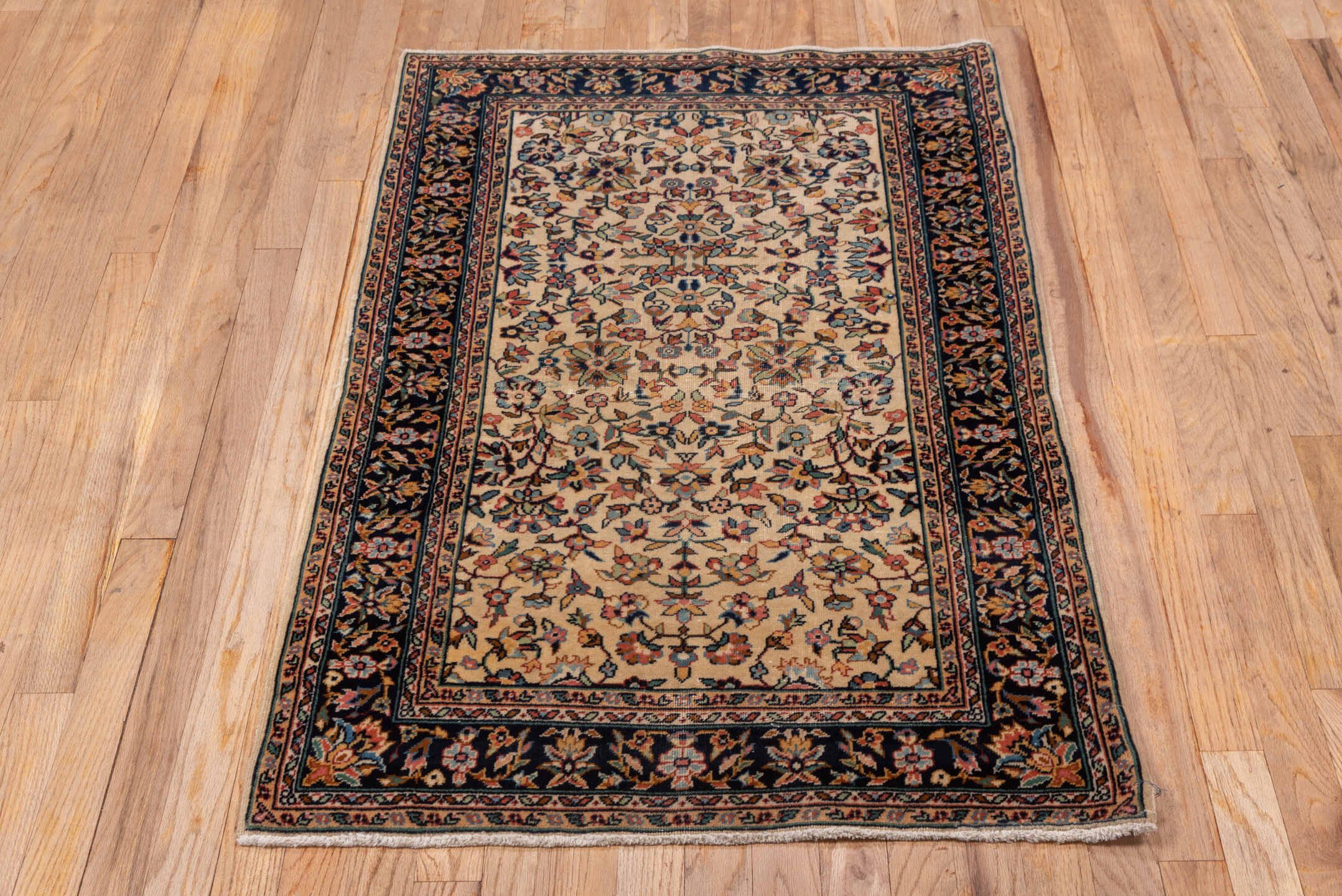 2' x 4' one-of-a-kind handmade vintage Sivas small size rug. Color palette: ivory, navy, rust, camel, sage, powder_blue