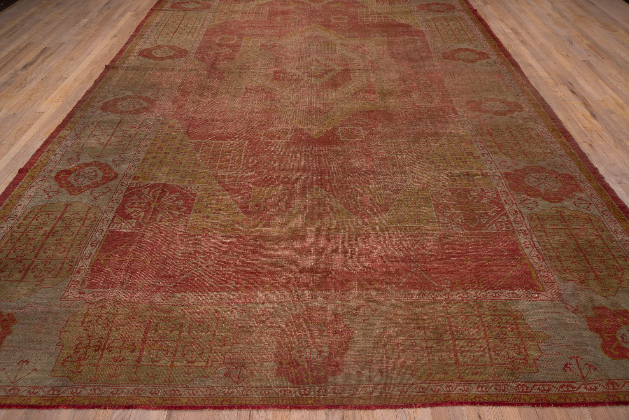 10' x 15' one-of-a-kind handmade vintage Oushak rug. Color palette: coral, rose, beige, gold, terra cotta, camel, rust