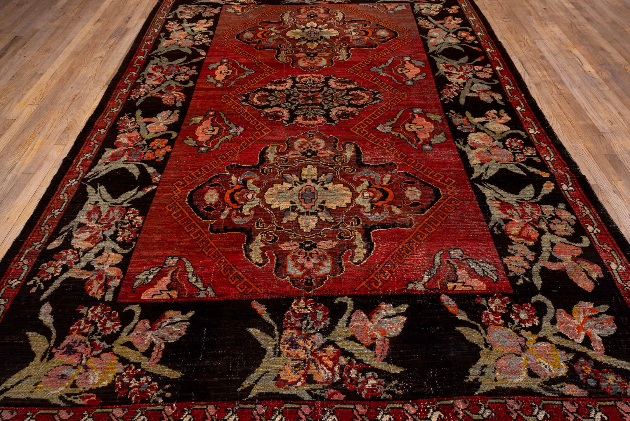 7' x 12' one-of-a-kind handmade antique Kars large size rug. Color palette: rust, charcoal, coral, ivory, rose, slate
