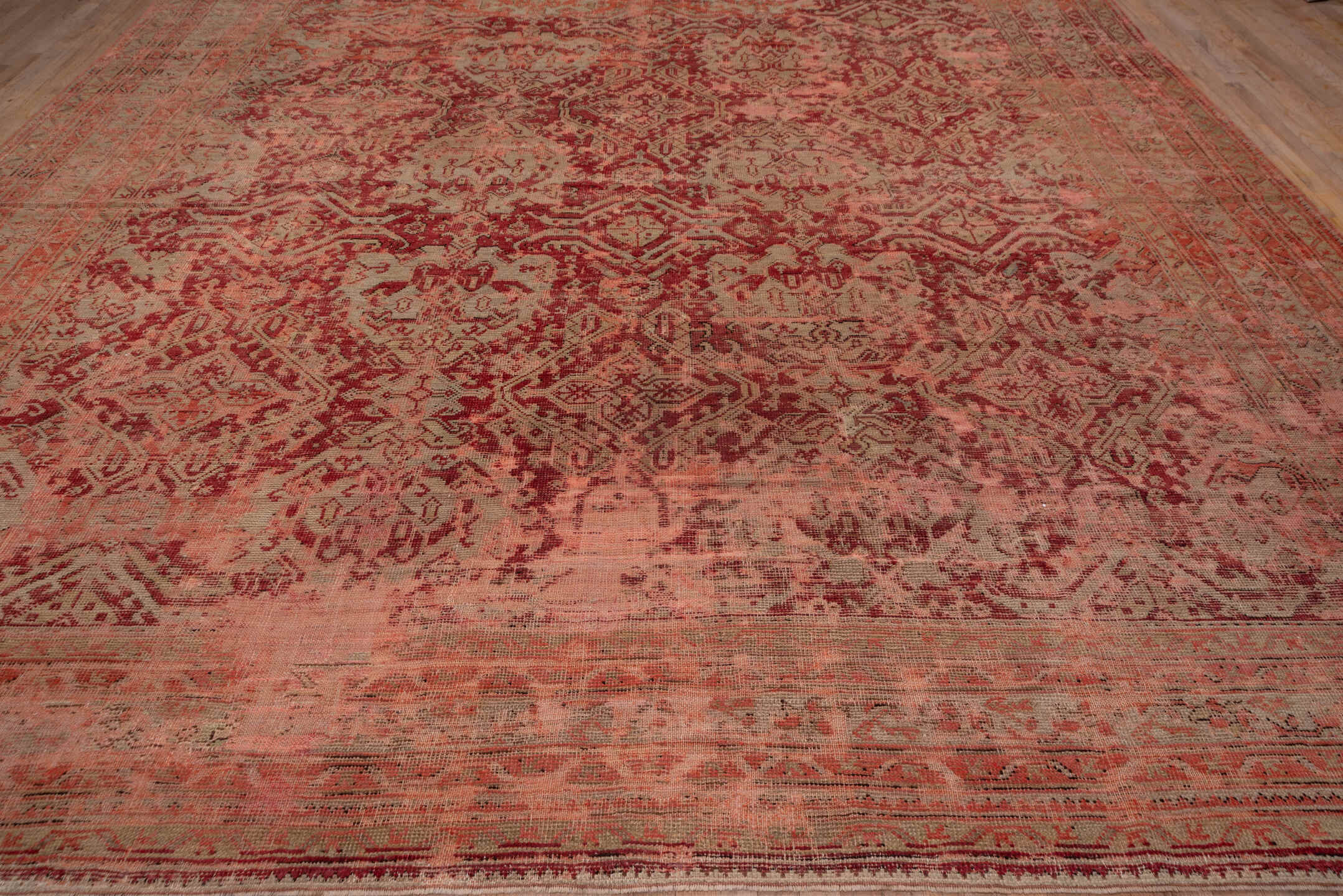 12' x 17' one-of-a-kind handmade antique Oushak oversize rug. Color palette: coral, rose, terra cotta, burgundy, dusty pink