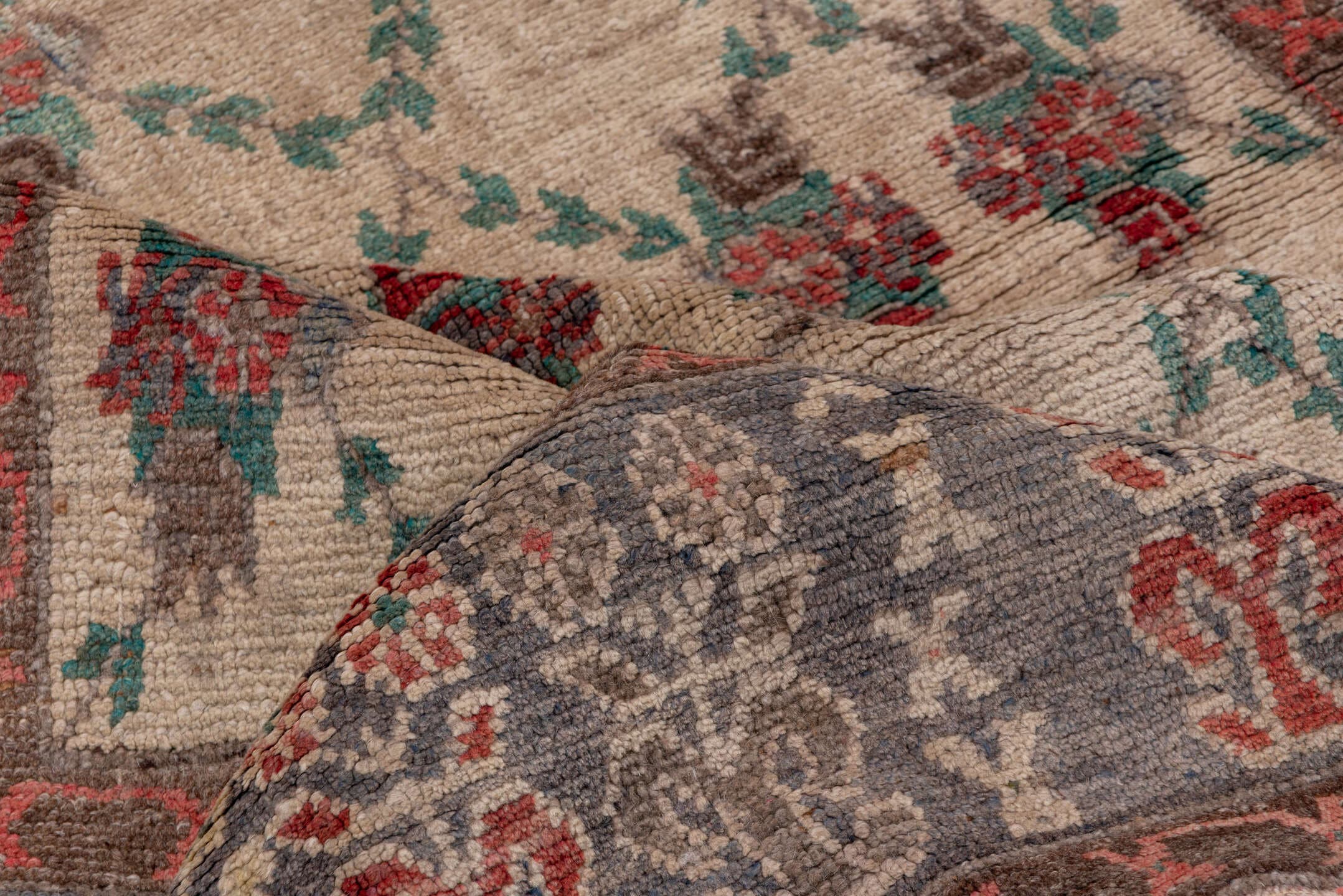 5' x 10' one-of-a-kind handmade vintage Konya rug. Color palette: ivory, charcoal, rust, teal, taupe, gold, crimson, gray