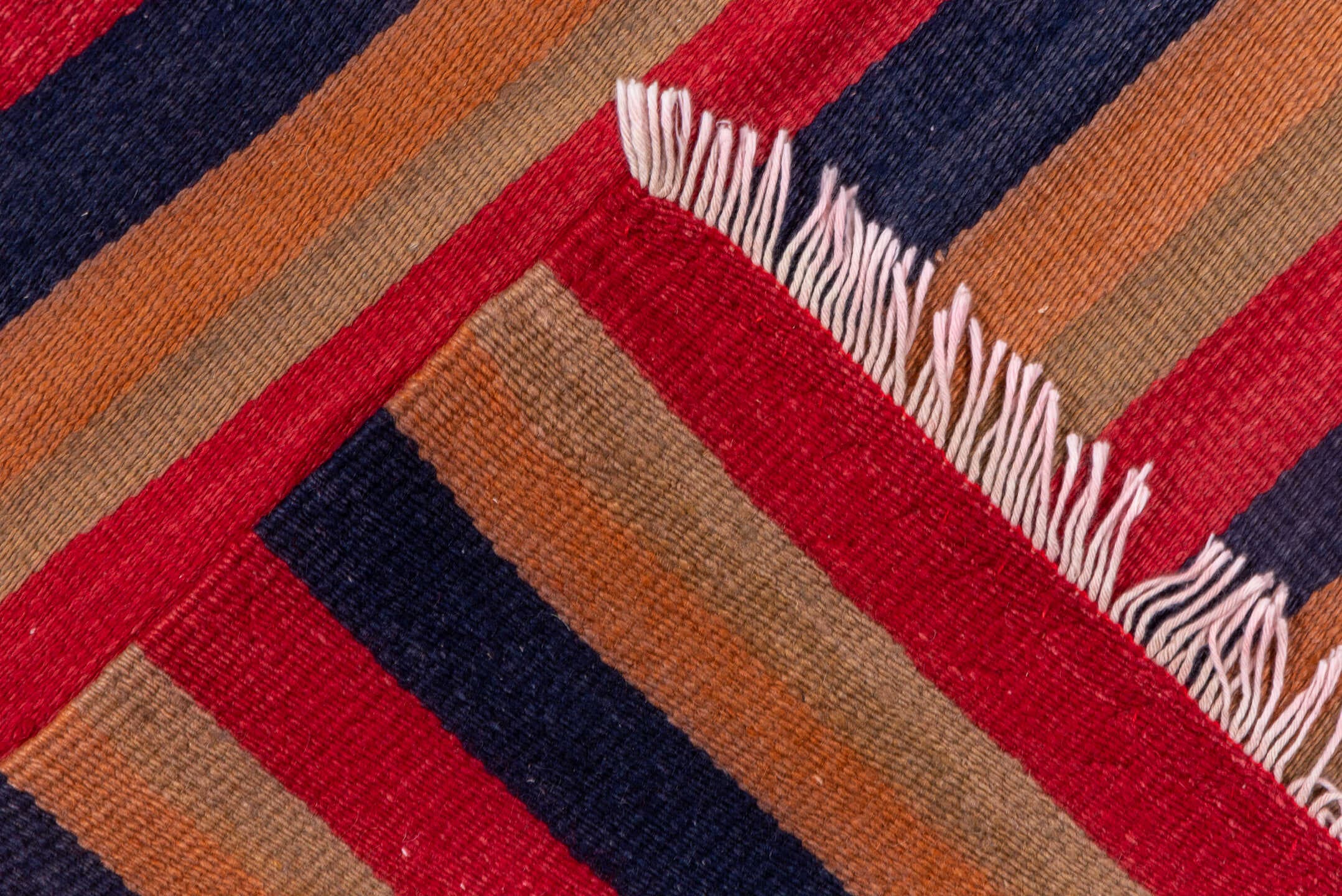 4' x 10' one-of-a-kind handmade vintage Kilim runner rug. Color palette: camel, navy, rust, red, tan, beige, blue