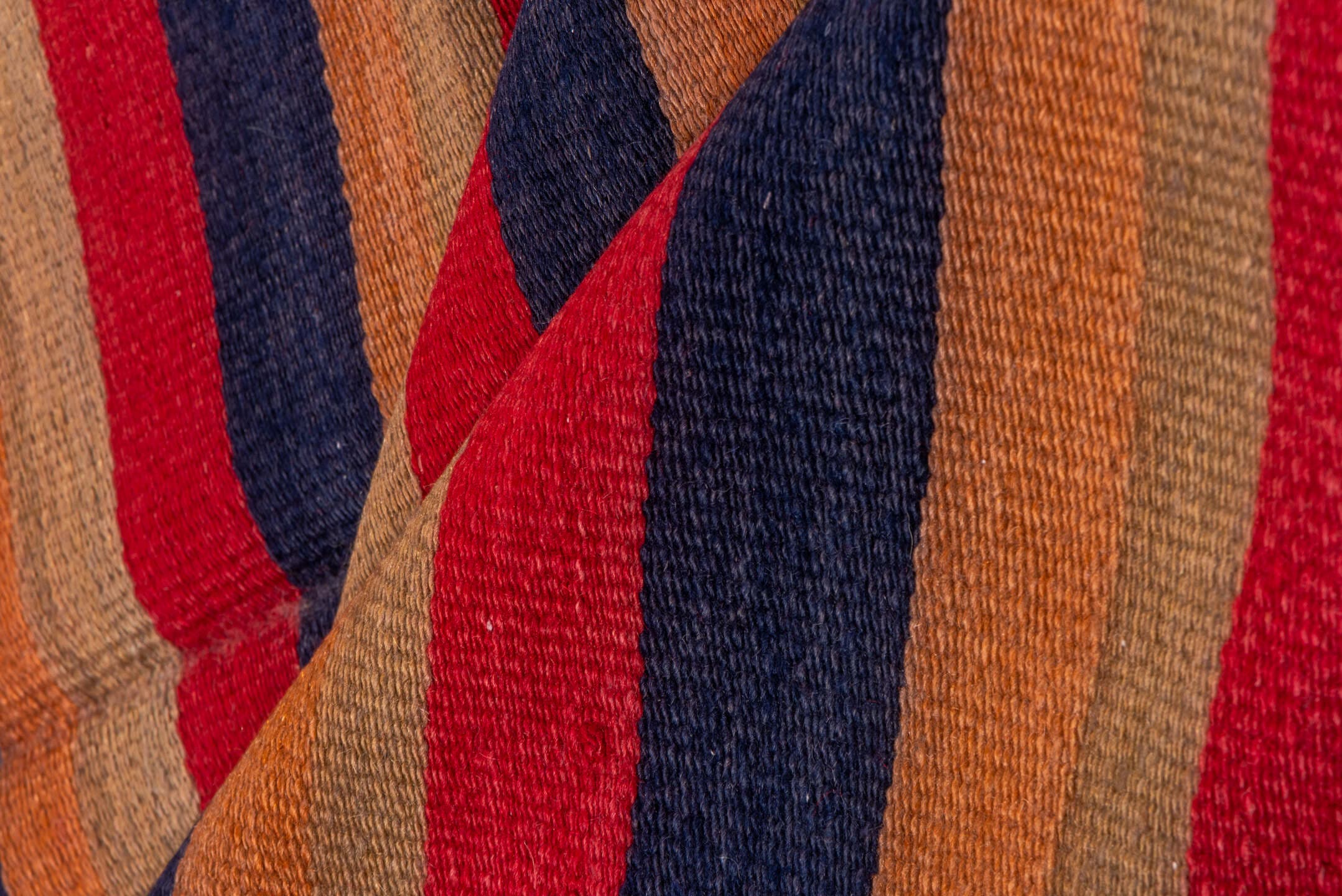 4' x 10' one-of-a-kind handmade vintage Kilim runner rug. Color palette: camel, navy, rust, red, tan, beige, blue