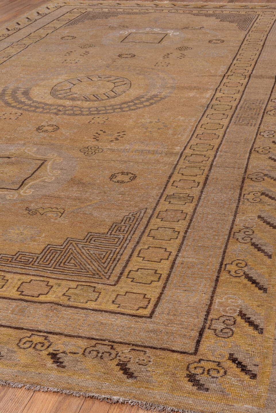 7' x 13' one-of-a-kind handmade antique Khotan large size rug. Color palette: camel, taupe, beige, brown, ivory, ochre, gray