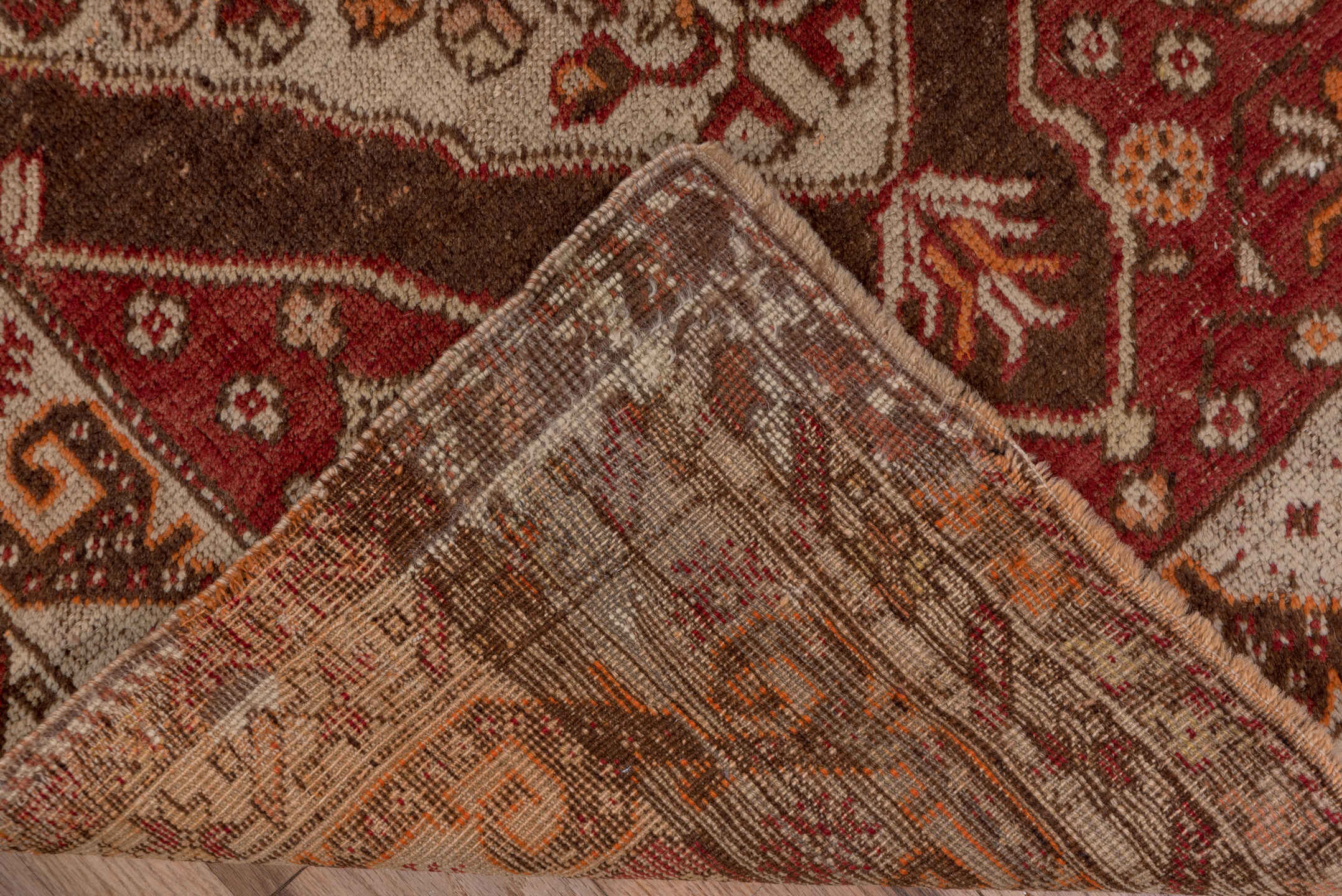 3' x 11' one-of-a-kind handmade vintage Sivas runner rug. Color palette: rust, ivory, terra cotta, brown, burgundy, camel