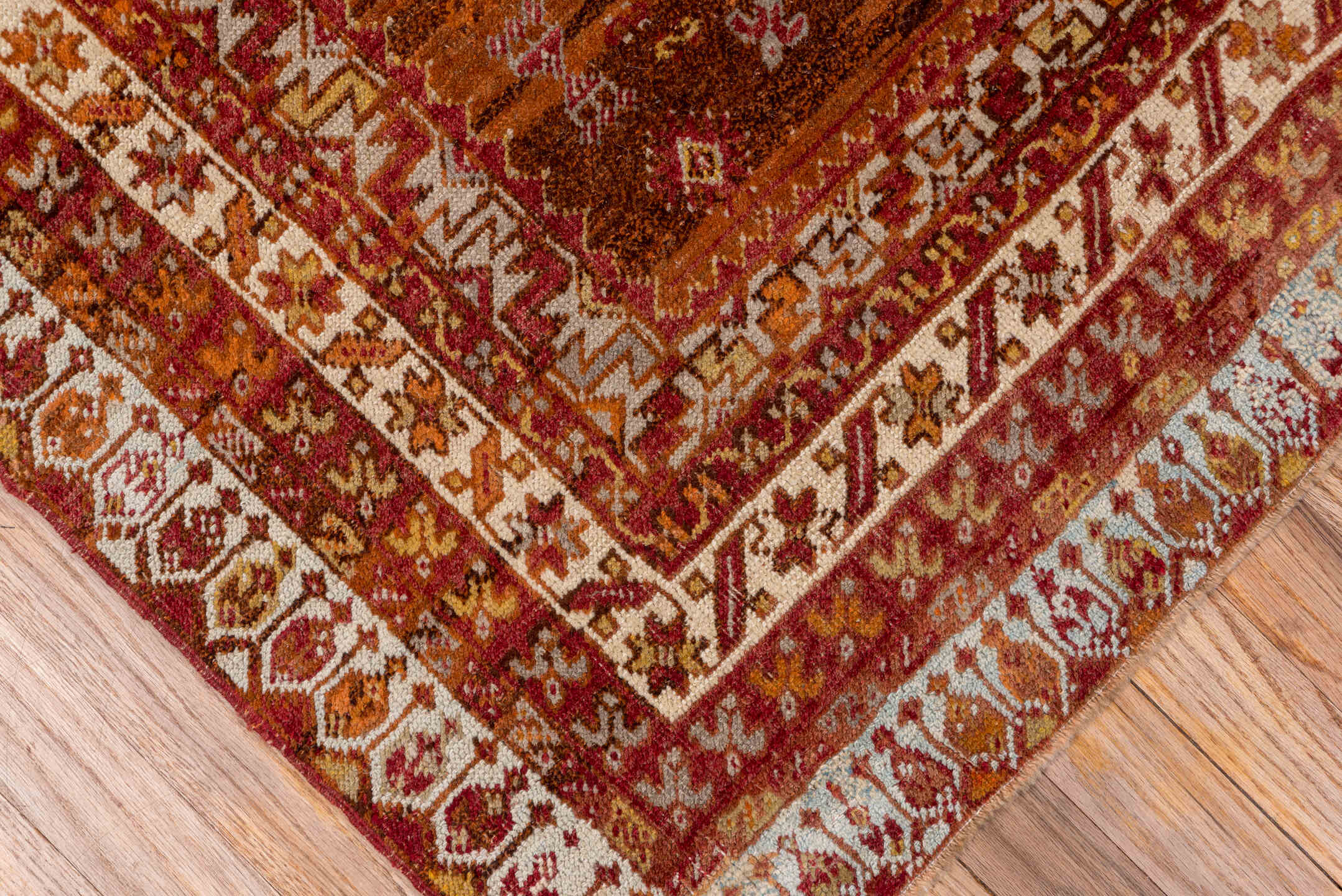 3' x 5' one-of-a-kind handmade vintage Sivas small size rug. Color palette: brown, gray, light gray, off-white, orange, pink