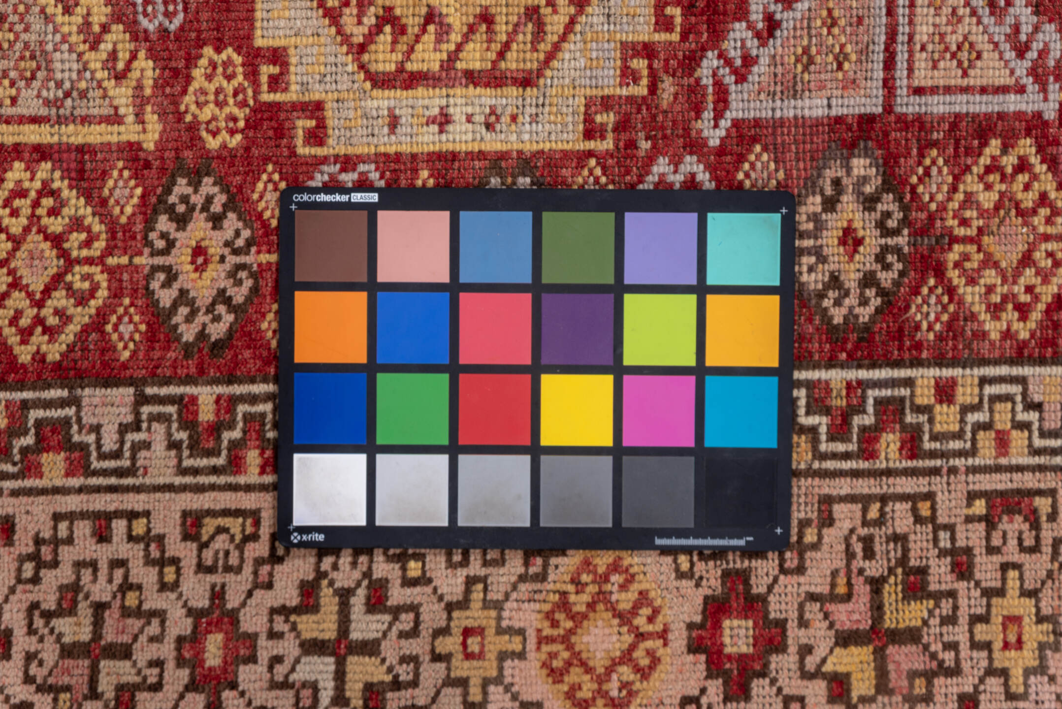 4' x 11' one-of-a-kind handmade vintage Kurd runner rug. Color palette: brown, pink, red