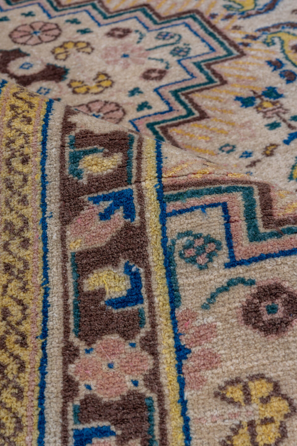 5' x 8' one-of-a-kind handmade vintage Sivas medium size rug. Color palette: ivory, blue, brown, taupe, gold, camel, beige