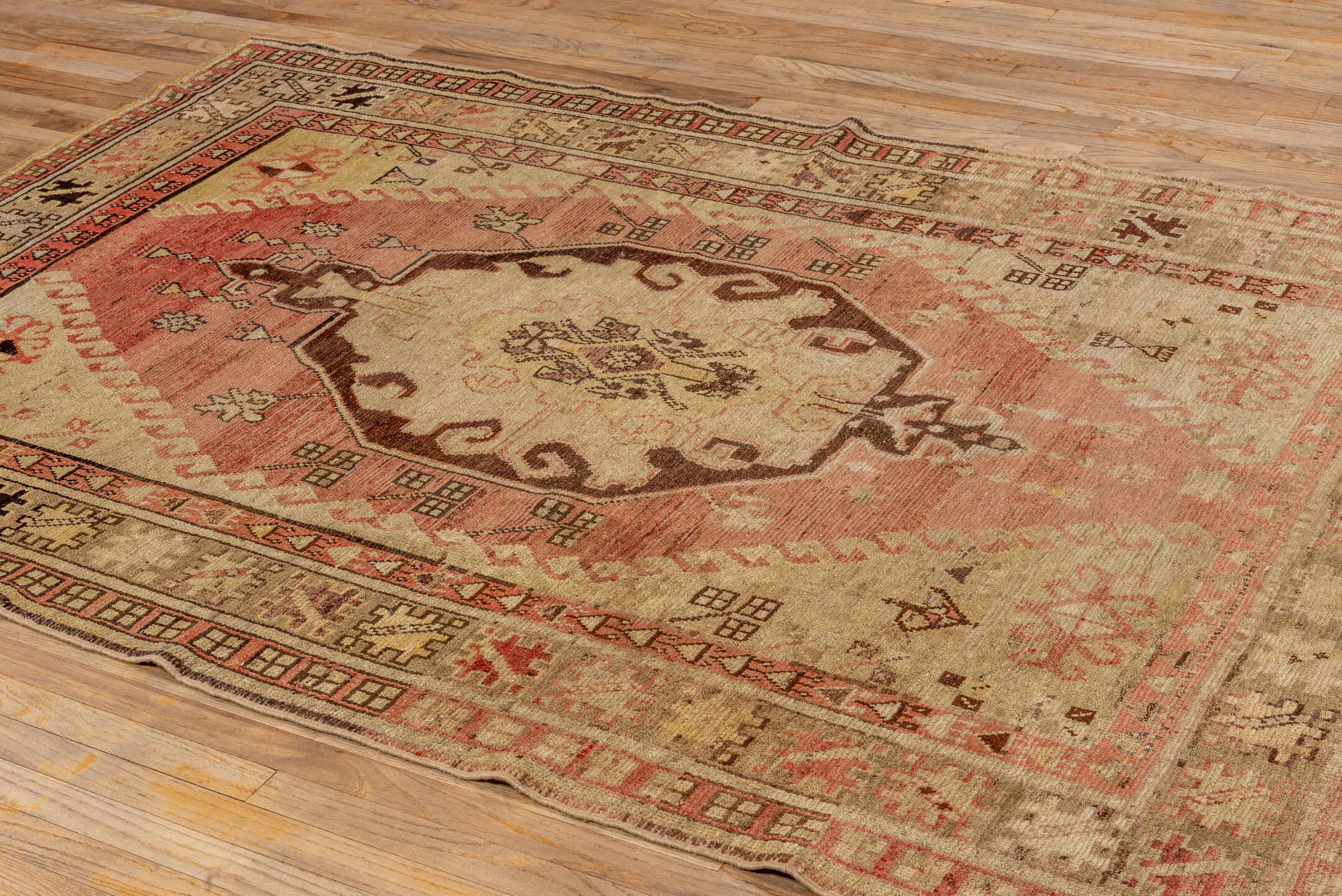 5' x 8' one-of-a-kind handmade vintage Oushak medium size rug. Color palette: brown, burlywood, off-white, orange, pink, tan