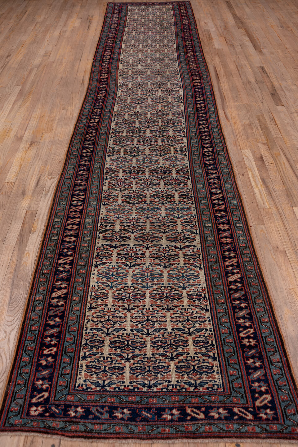 3' x 16' one-of-a-kind handmade vintage NW Persian runner rug. Color palette: blue, brown, dim gray, gray, pink, red