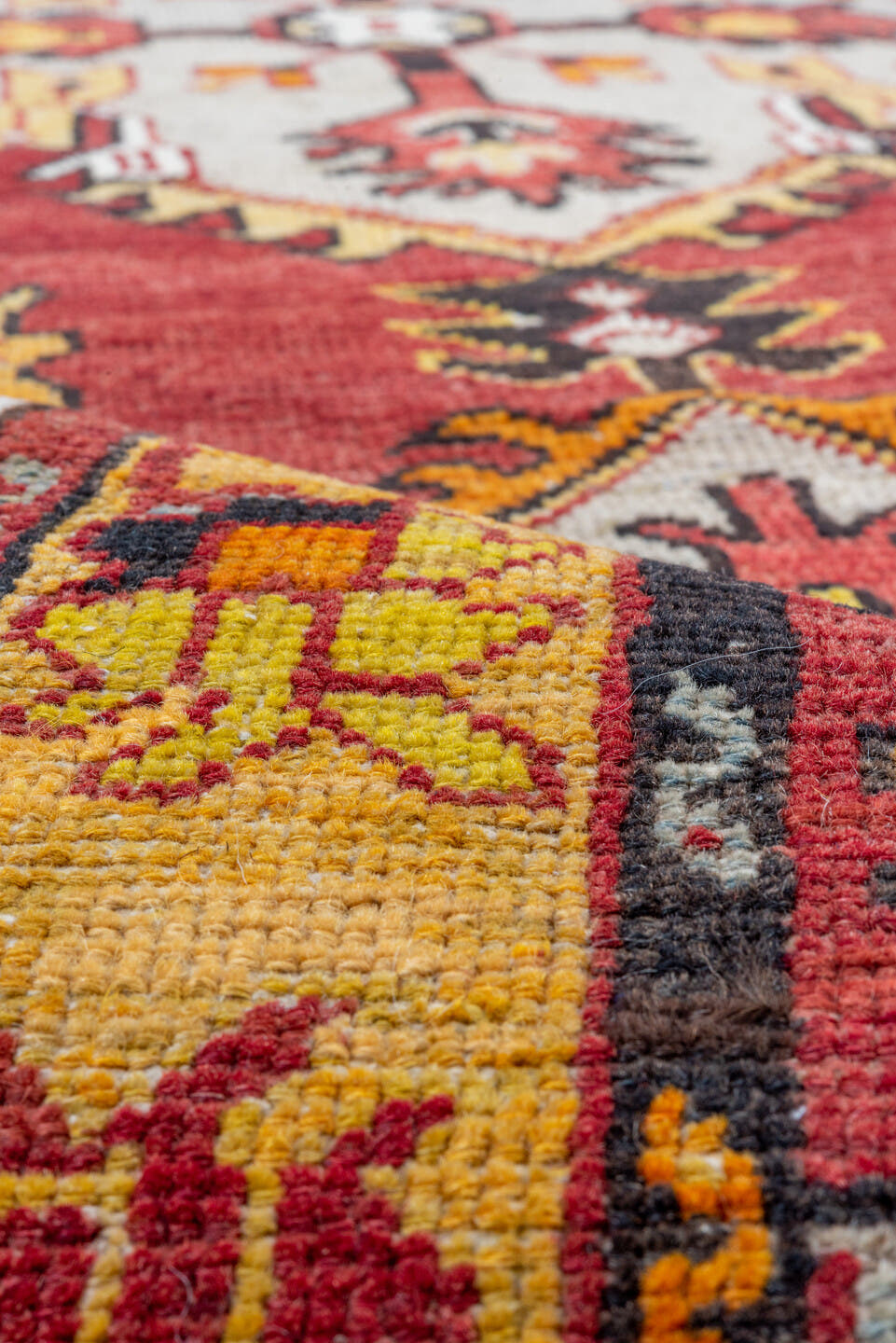2' x 9' one-of-a-kind handmade vintage Oushak runner rug. Color palette: red, gold, ivory, rust, saffron, charcoal, rose