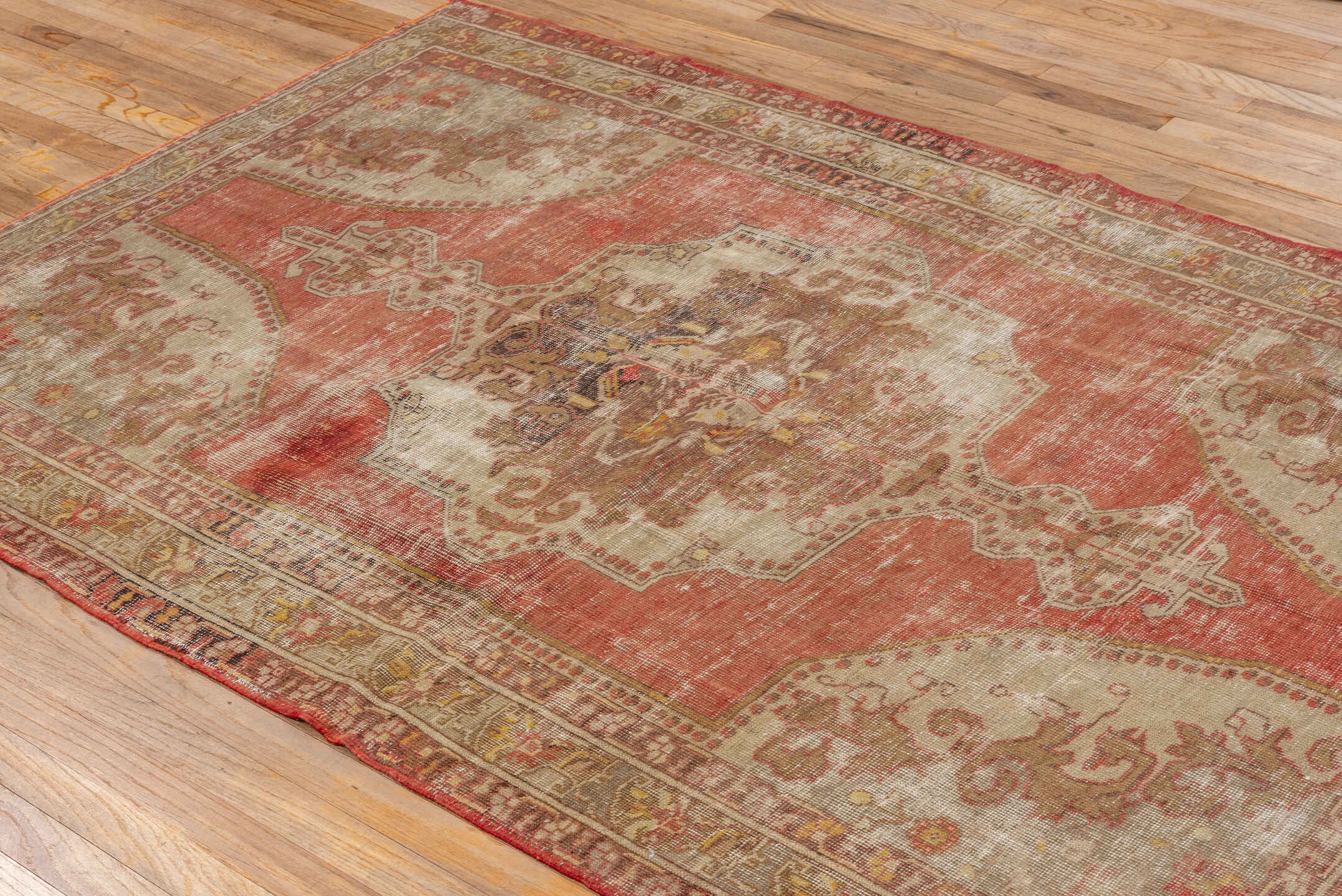 4' x 7' one-of-a-kind handmade vintage Oushak rug. Color palette: terra cotta, ivory, taupe, sage, rust, gold, brown