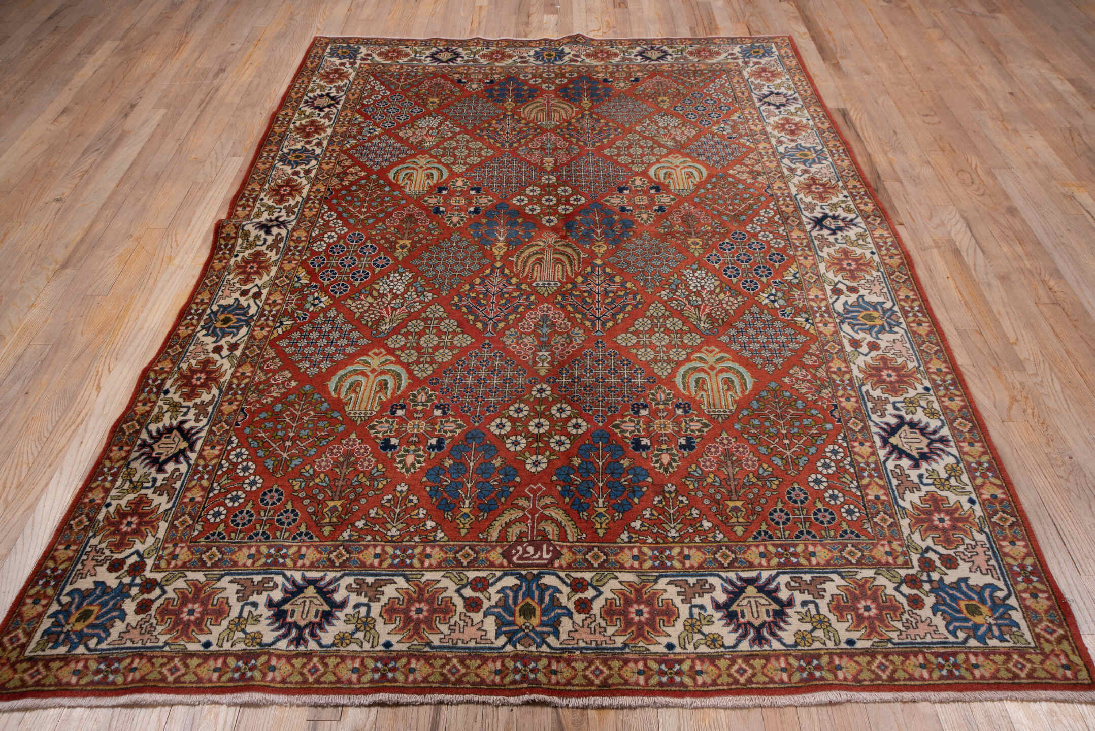 6' x 8' one-of-a-kind handmade antique Tabriz medium size rug. Color palette: rust, ivory, navy, blue, camel, rose, gold