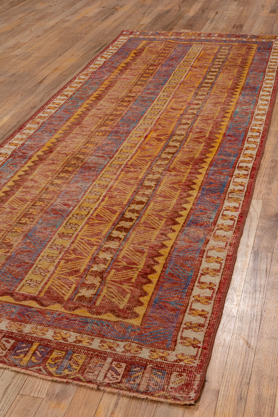 3' x 9' one-of-a-kind handmade vintage Oushak runner rug. Color palette: rust, ivory, blue, gold, terra cotta, camel