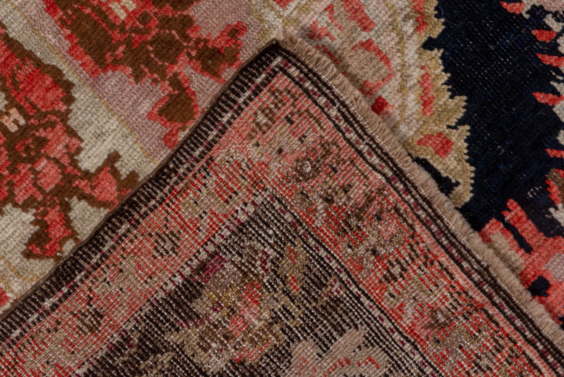 5' x 12' one-of-a-kind handmade antique Karabagh rug. Color palette: ivory, navy, rose, rust, charcoal, taupe, coral, blue