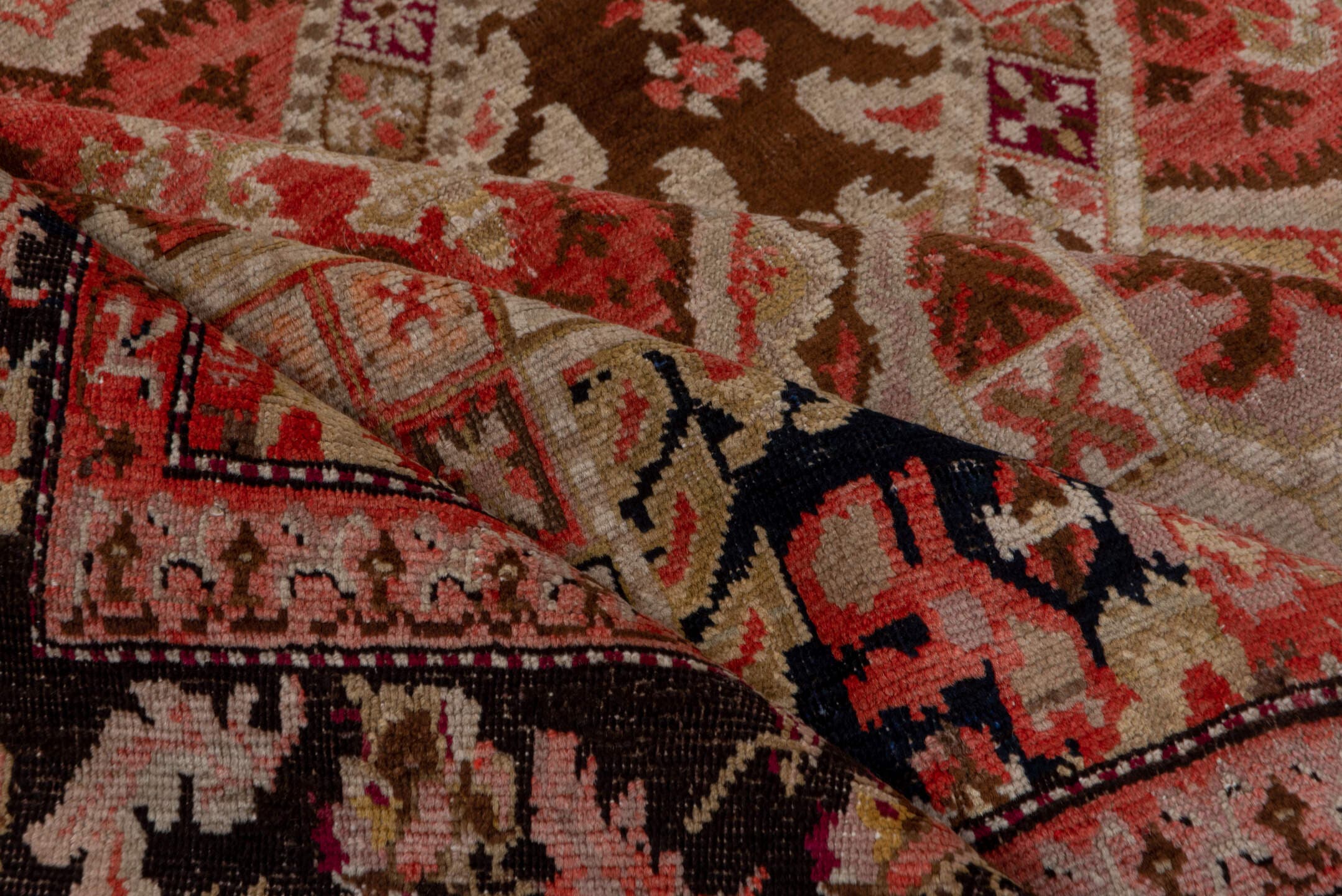5' x 12' one-of-a-kind handmade antique Karabagh rug. Color palette: ivory, navy, rose, rust, charcoal, taupe, coral, blue