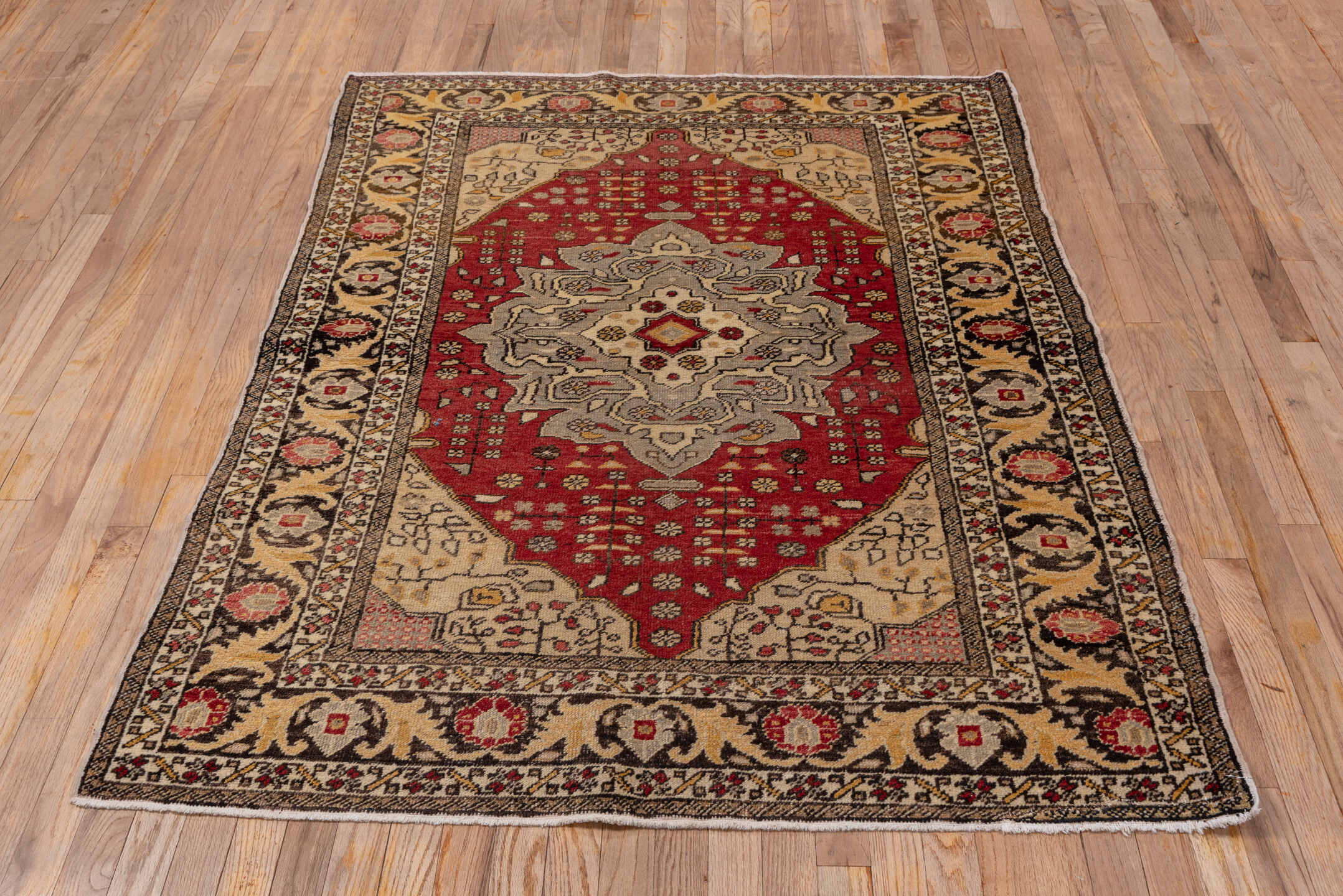 4' x 6' one-of-a-kind handmade vintage Oushak small size rug. Color palette: ivory, red, charcoal, gray, gold, rose, camel