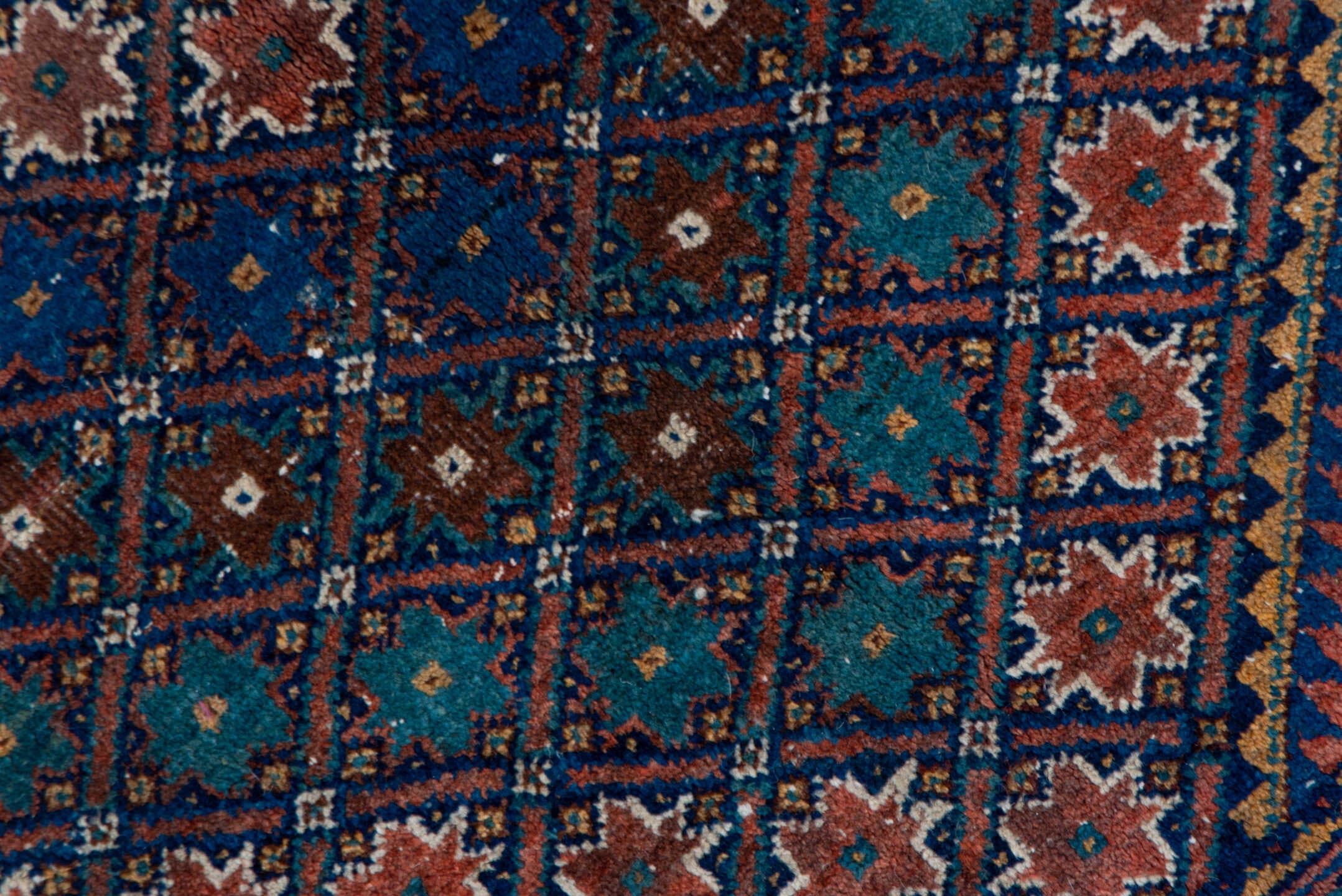 5' x 7' one-of-a-kind handmade antique Afshar rug. Color palette: navy, rust, camel, teal, ivory, rose, brown, blue