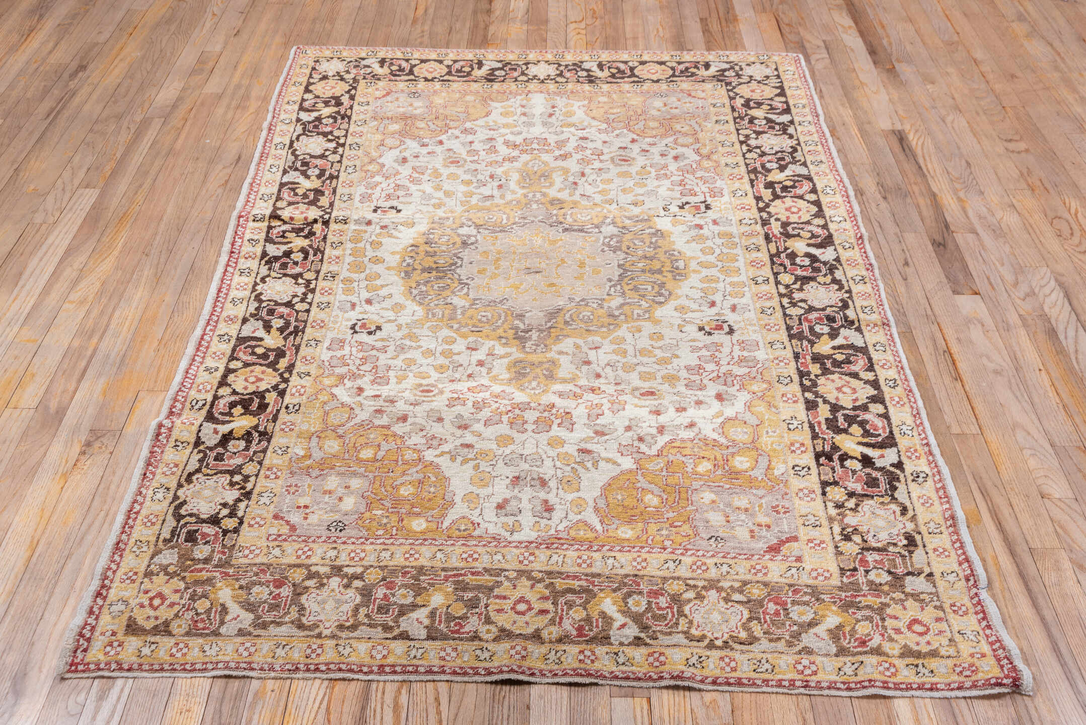 4' x 7' one-of-a-kind handmade vintage Oushak rug. Color palette: ivory, gold, brown, taupe, rose, camel, charcoal, beige