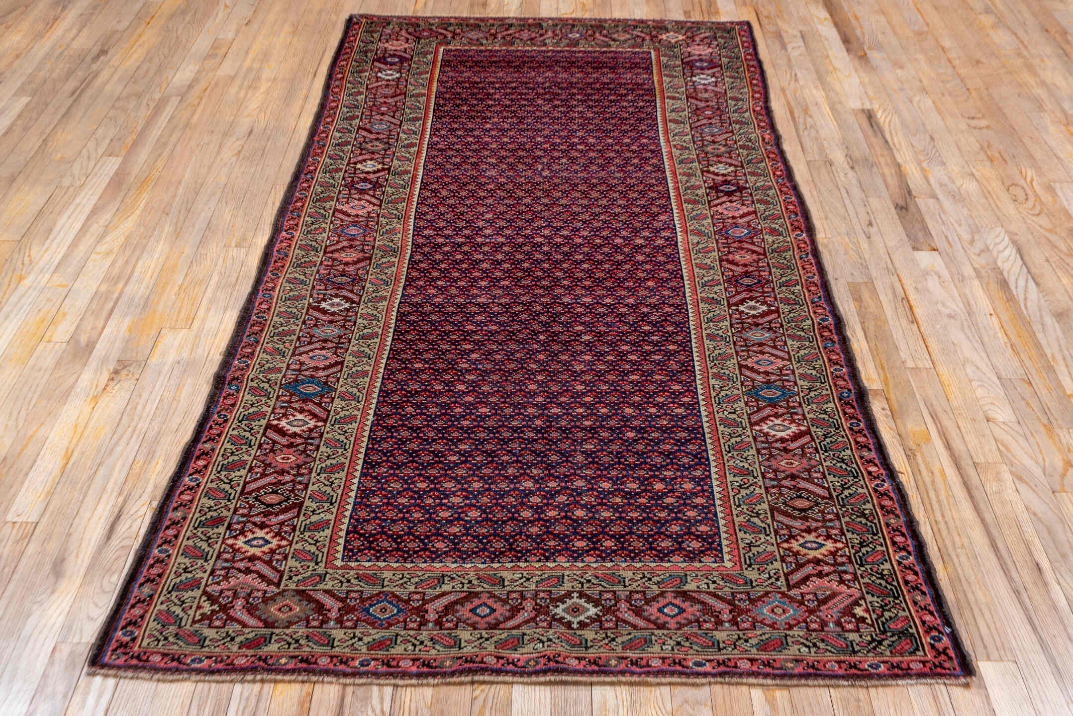 4' x 8' one-of-a-kind handmade vintage Malayer rug. Color palette: burgundy, ivory, navy, rust, rose, camel, slate, blue