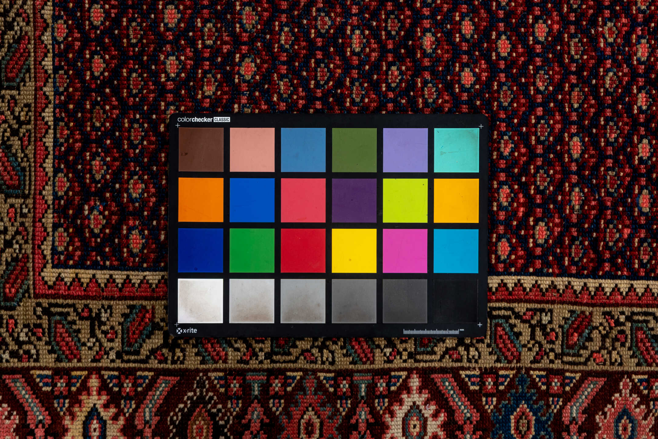 4' x 8' one-of-a-kind handmade vintage Malayer rug. Color palette: black, brown, gray, pink, red, rosy brown