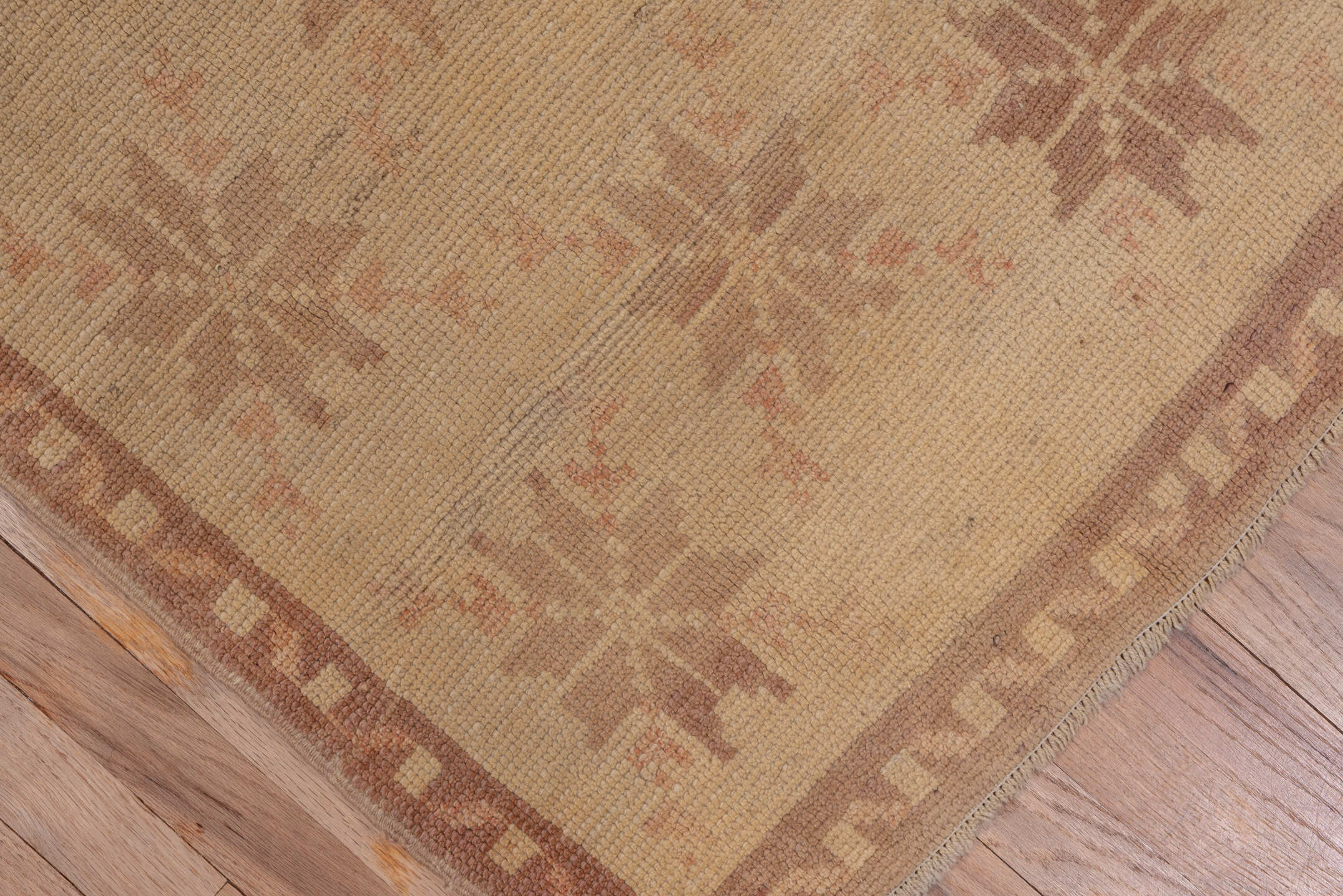 3' x 10' one-of-a-kind handmade vintage Tulu runner rug. Color palette: brown, pink, tan