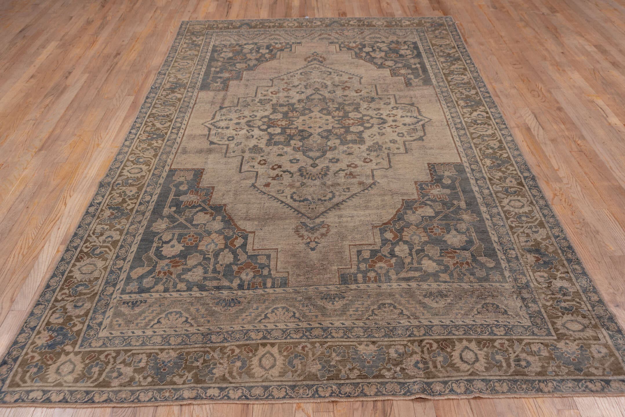 6' x 10' one-of-a-kind handmade vintage Oushak large size rug. Color palette: taupe, slate, ivory, camel, rust, blue, brown